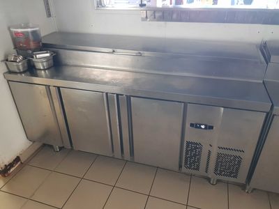 a stainless steel counter in a commercial kitchen