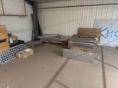 a room with a lot of boxes and boxes on the floor