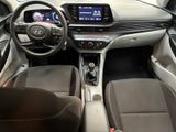 the interior of a car with a steering wheel, dashboard, and dash board