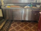 a kitchen with a lot of counter space in it