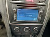 a picture of a car dashboard with a dvd player in it