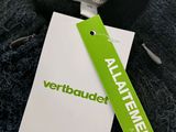 a tag on a sweater that says verbbuudet