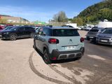 a lot of cars parked in a parking lot