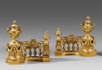 Paire de têtes de barres de foyer à décor d'urnes et pots à …