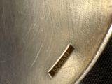 a close up of a metal object on a table