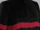 a black and red striped coat on a mannequin mannequin mannequin mannequin mannequin mannequin mannequin mannequin
