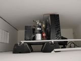 a picture of a shelf with a bunch of electronics on it