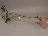brass plated table lamp with pink glass shade and wire