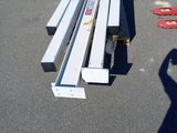 a bench that is sitting in the middle of a parking lot