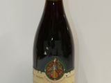 a bottle of wine that is sitting on a table