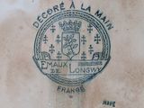 a picture of a plate that has a seal on it