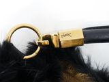 black and gold fur purse with a gold metal keychain