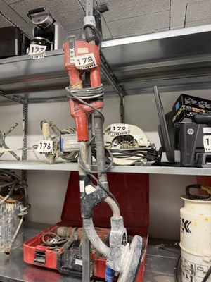 many different tools on the shelves in the room