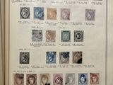 a book with a bunch of stamps on it