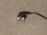 a black and white cord connected to a black and white plug
