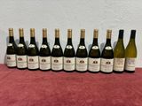 a group of bottles of wine sitting on top of a table