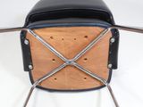 an image of a chair made of wood and black leather