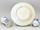 a white plate with a blue and white design on it