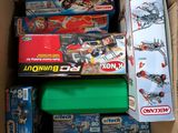 a box full of legos and other toys in it