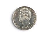 an image of a coin on a white surface