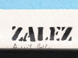 a sign that says zaliz on the side of a building
