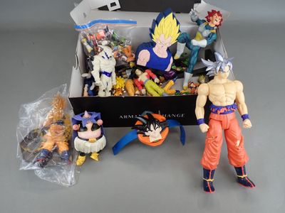 a box of dragon ball action figures on a table