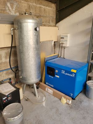 an image of a water heater in a garage