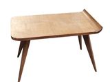 a close up of a wooden table on a white background