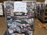 a metal cart with many items in it in a warehouse