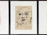 three framed drawings of a woman ' s face and a man ' s face