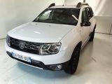 the front of a white dacia parked in a white room
