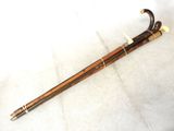 a cane that is sitting on the floor