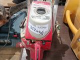 a picture of a chainsaw sitting on top of a table