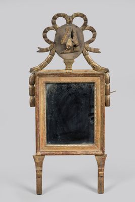 an image of a wooden mirror with a goat ' s head on it