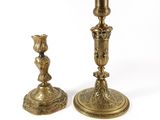 pair of antique brass candlesticks with a bird on the base