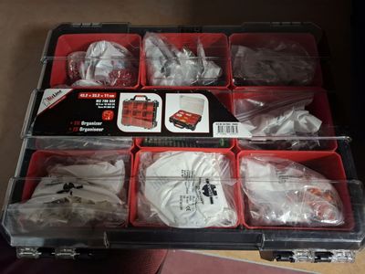 a plastic case with many different items in it