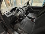 the interior of a car with a steering wheel, dashboard, and dashboard controls