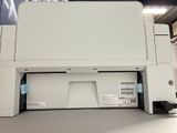a printer that is sitting on top of a table