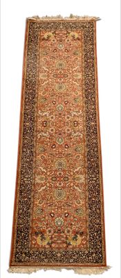an oriental rug with a long border and a design on the bottom