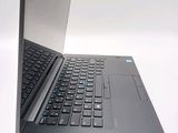 a laptop that is open and sitting on a table