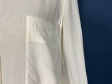 a close up of a white shirt with a pocket on a mannequin mannequin mannequin mannequin mannequin mannequin manne
