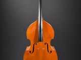an old cello on a black background