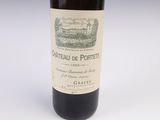 a bottle of wine that is sitting on a table