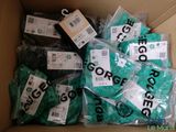 a box full of green and black items that are in it