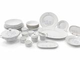 a picture of a collection of white and blue dinnerware