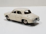 a toy car that is sitting on a white surface