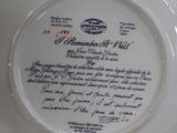 a plate with a poem written on it on a table