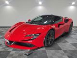 une Ferrari rouge garée dans un garage