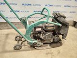 an image of a lawn mower in a garage