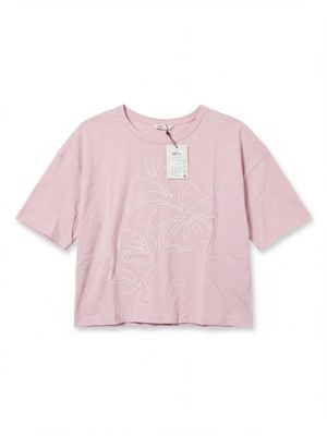 a pink t - shirt with a floral design on the front